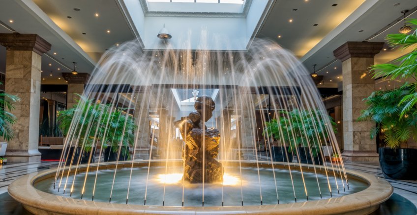 Firefly_A photorealistic interior photograph of a contemporary, sculptural water fountain cen 96486
